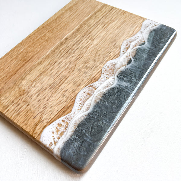 gray ocean waves on charcuterie board